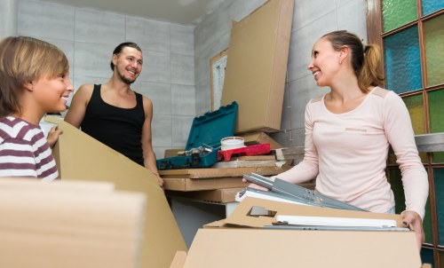House removals planning in Ilford with moving boxes and furniture