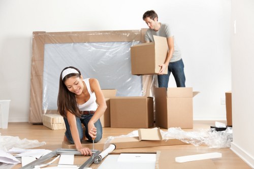 Man and van service loading household items for transport