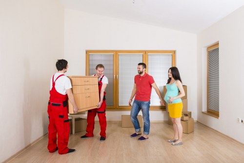 Packing and loading items into a van for an Ilford move