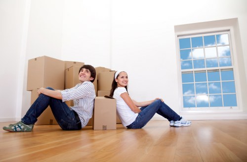 Local movers loading a van for an Ilford relocation