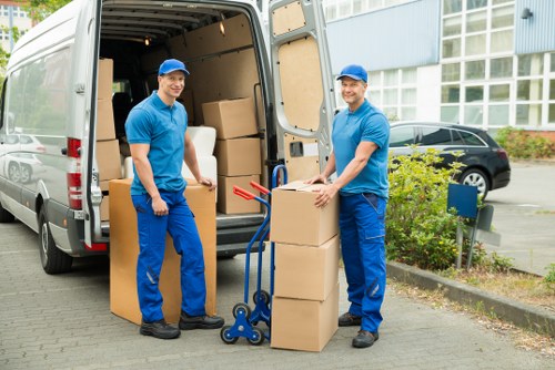 Packed boxes and moving equipment ready for a house move