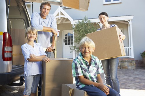 Removal van and team preparing for a house move in Ilford