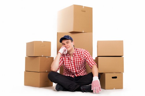 Removal crew loading commercial office items for an Ilford business move